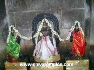 Muruga with his consorts